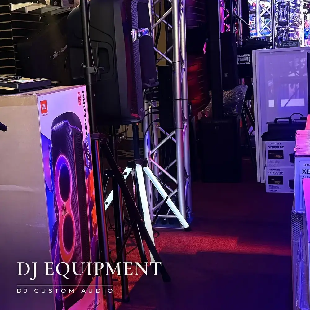 JBL speakers and a microphone on display