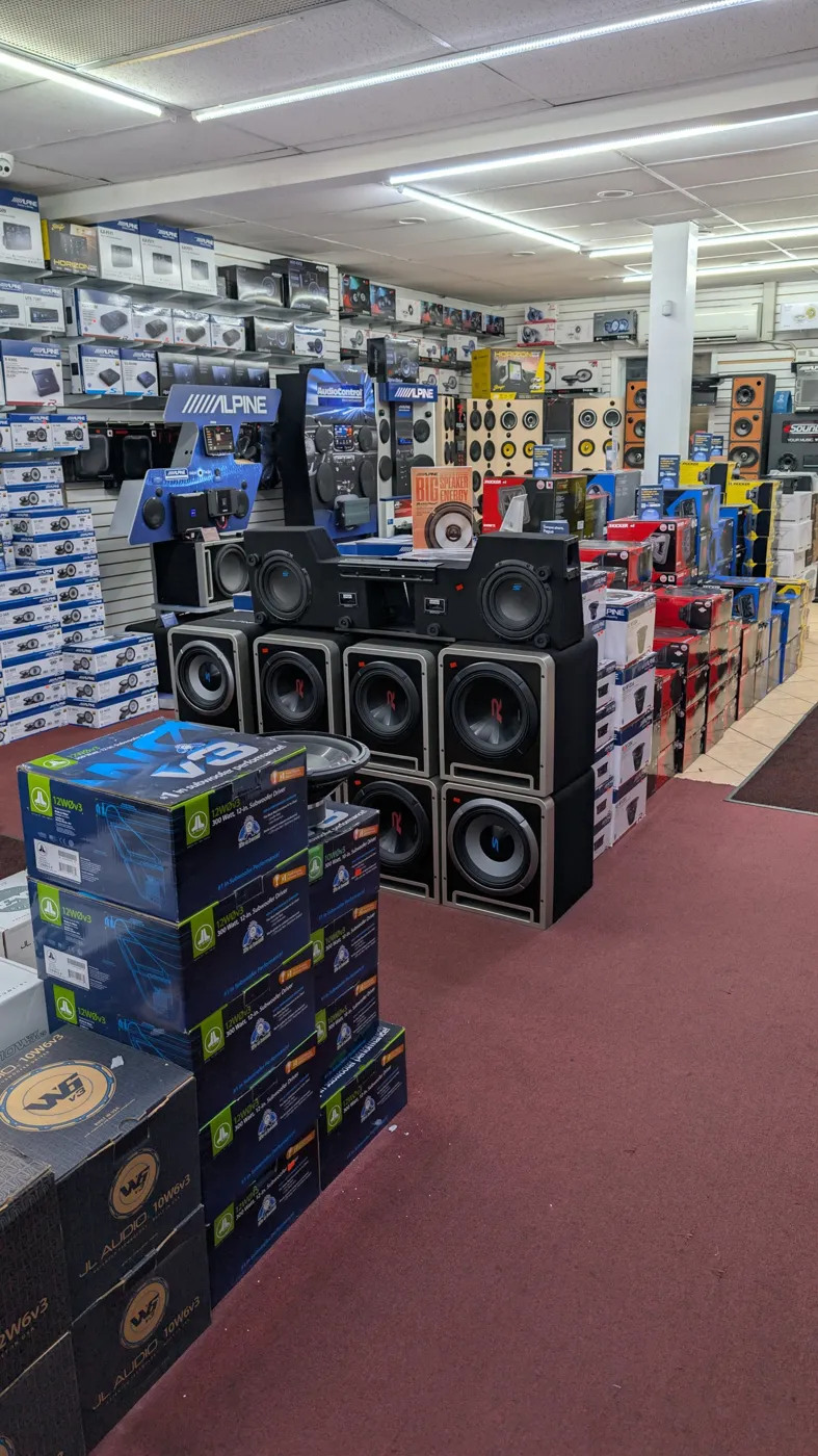 JL Audio W6v3 subwoofer boxes and powered subs on the car audio floor